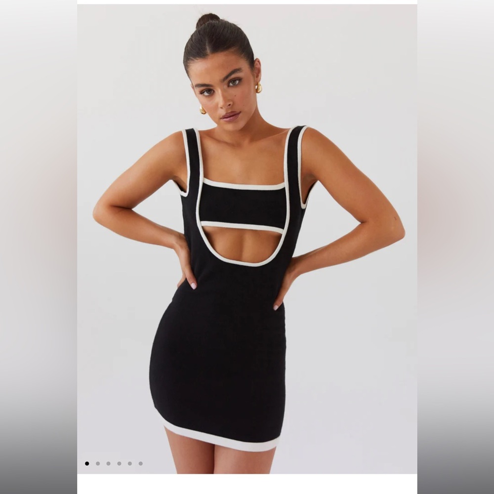 Peppermayo Black and white mini dress open back.
